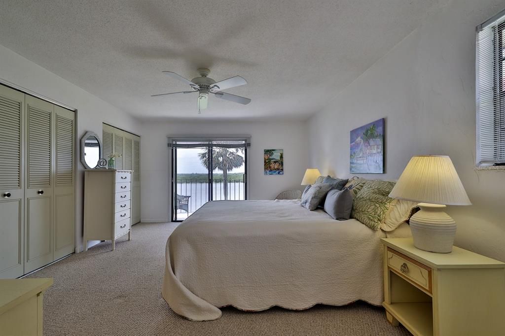 Primary bedroom with private balcony