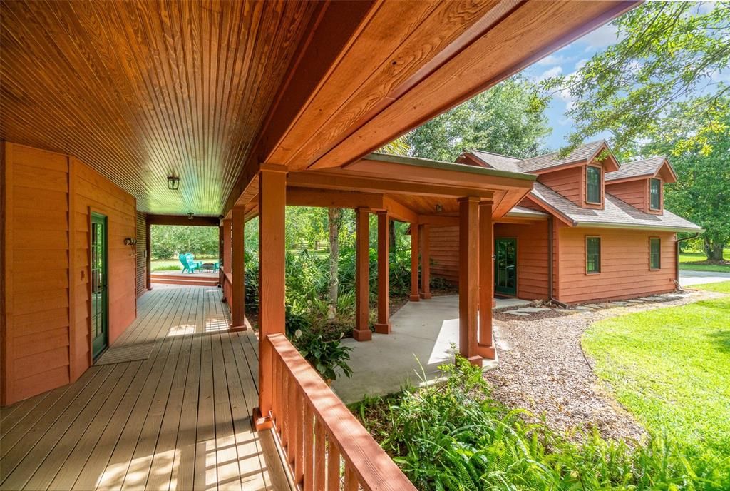 Wrap-around front porch with front door