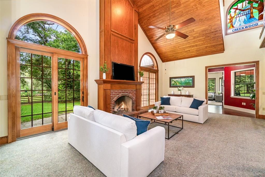 Great Room with twin sliding French doors looking out to gardens