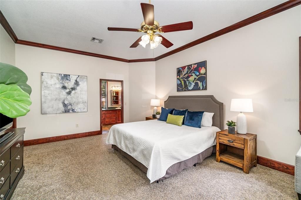 Master Bedroom with door in center of frame leading to the Master Bath