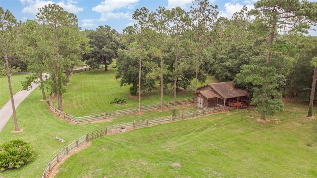 Stable and Stalls to right of drive as you are half way up to the house