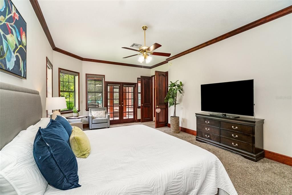 Master Bedroom and doors to the hallway on the right and to the outside on the left