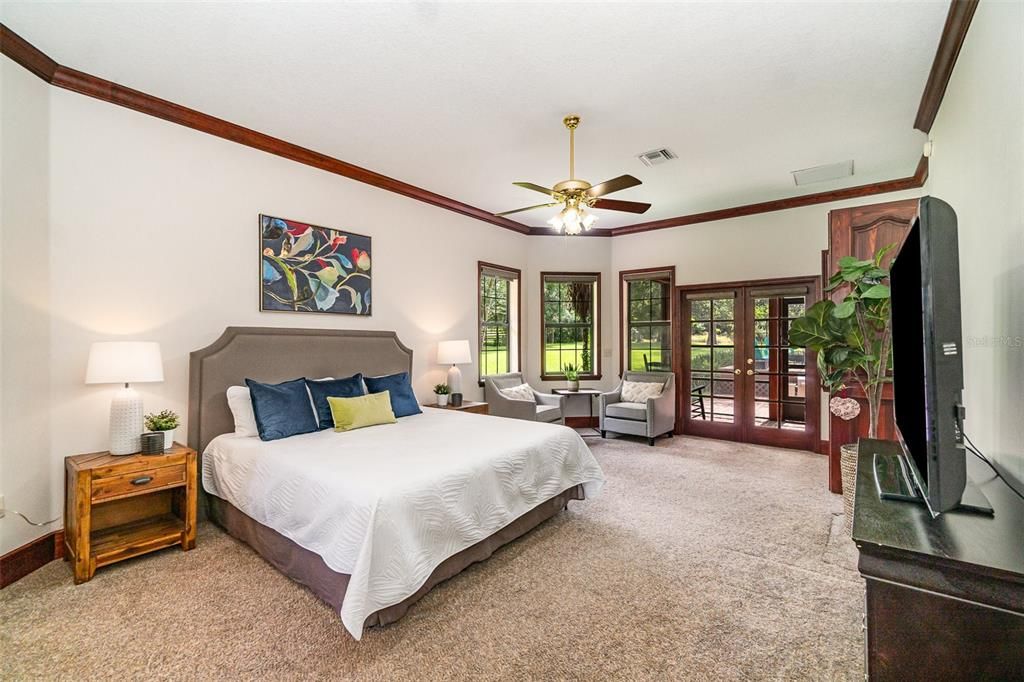 Master Bedroom with Doors leading outside to the Lanai