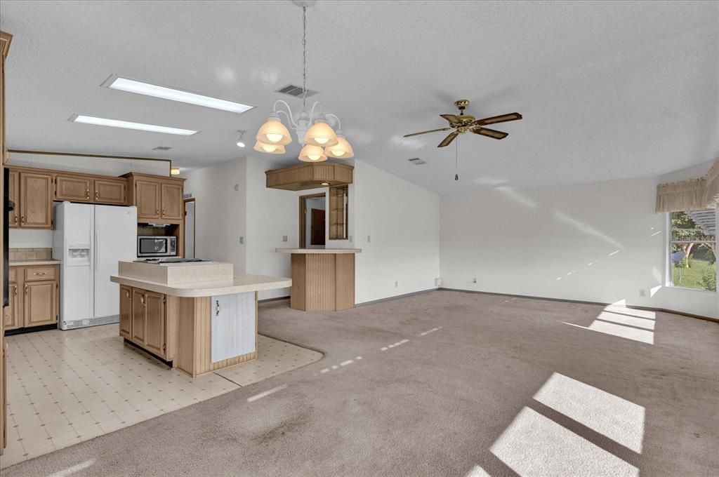 From Casual Dining Area, looking into Kitchen and Spacious Family Room