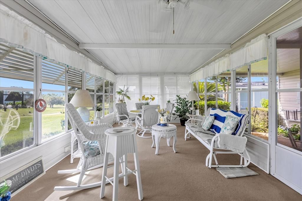 Covered Porch Glass Windows on 3 SidesFurnishings have been removed