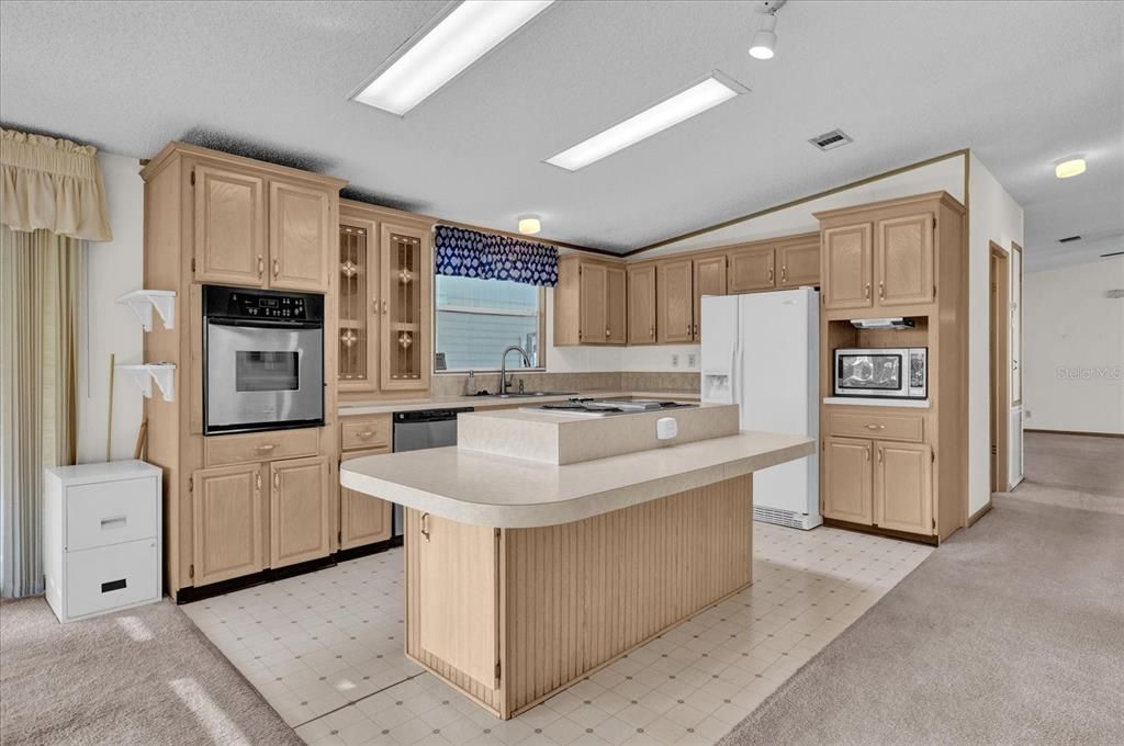 Kitchen view into Eat-In Family Room