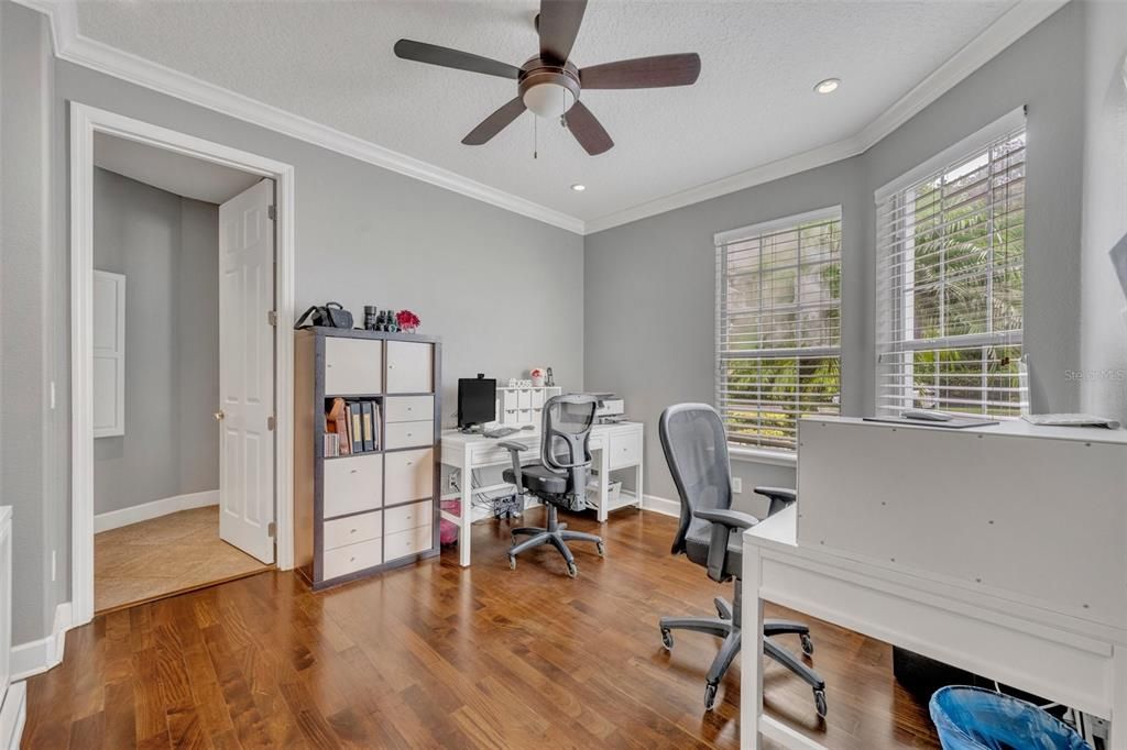 Office off main foyer with access to primary bedroom