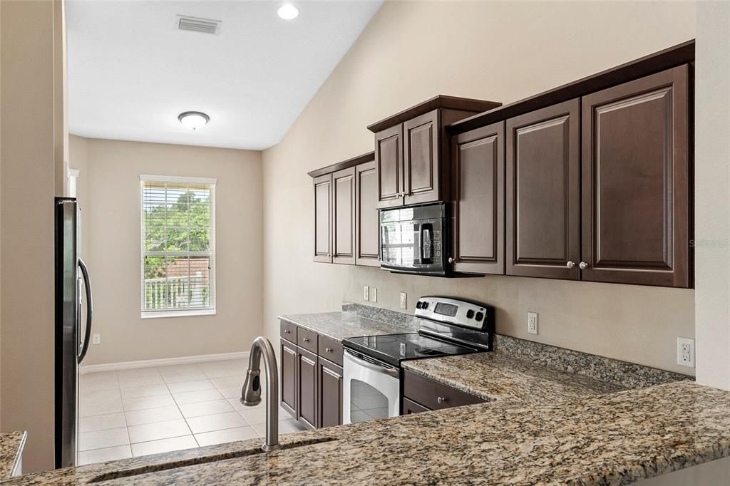 Granite Counters, Lush Real Wood Cabinets