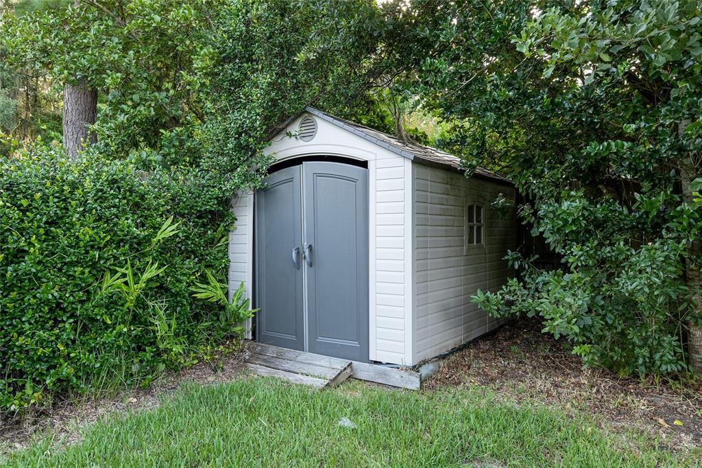 Storage shed conveys