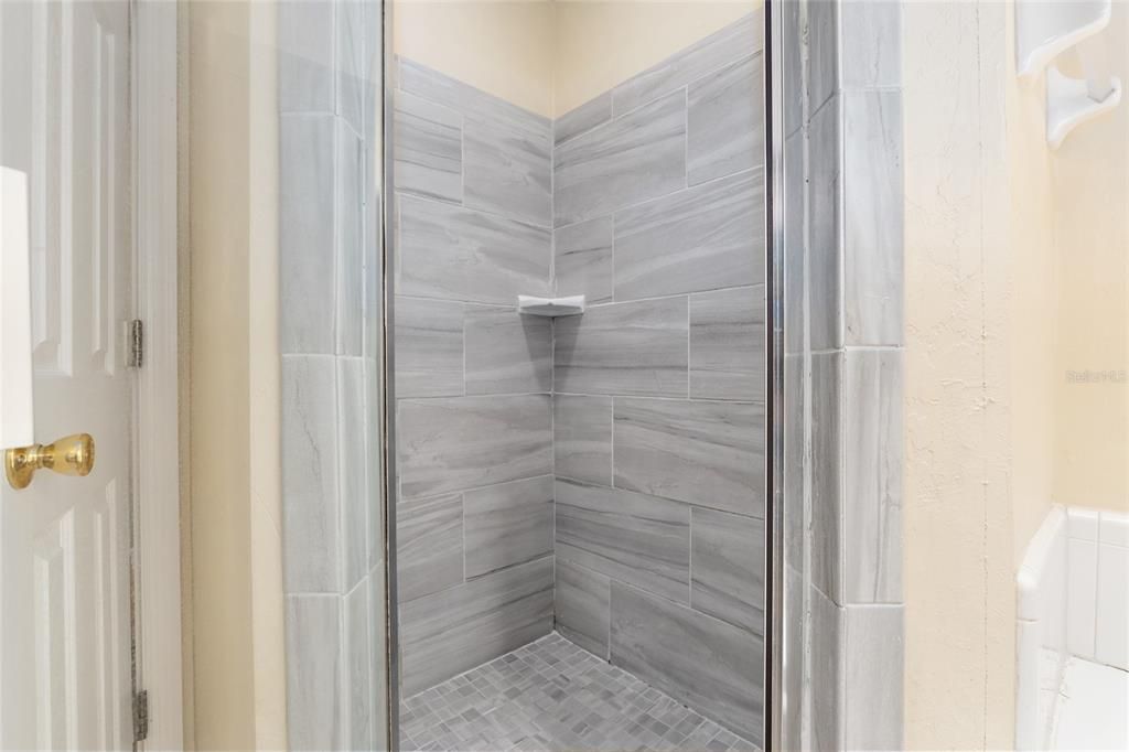 Walk-in shower, newly tiled