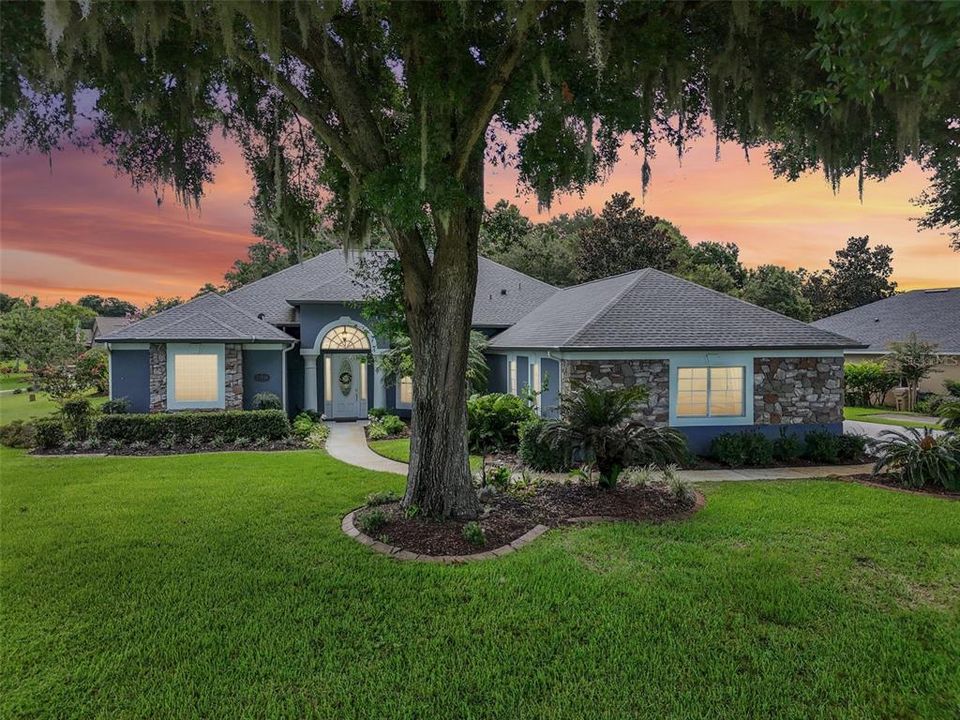 Welcome to Lakes and Springs in beautiful Yalaha and this single story MOVE-IN READY **POOL HOME** on a CORNER LOT totaling over HALF AN ACRE with a 3-WAY SPLIT FLOOR PLAN, 3-car side facing garage (w/ workshop!), formal and family spaces and a modern open kitchen!