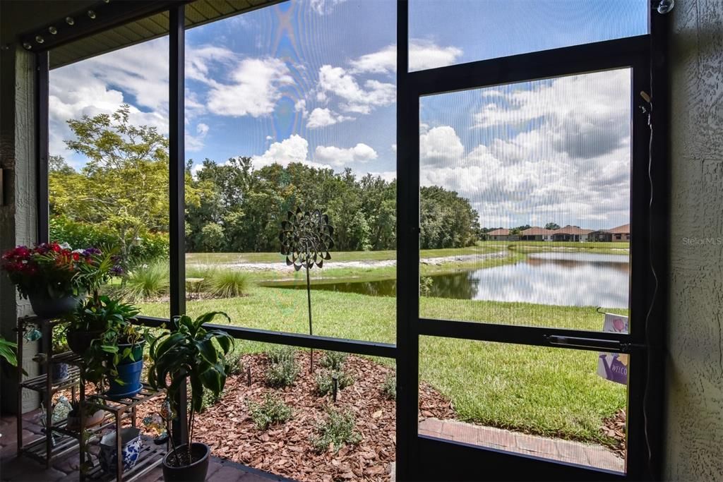 The lanai has roll down sun screens and ceiling fans. What a view!