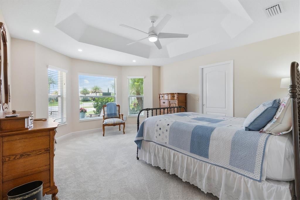 Bedroom #3  Featuring a BAY  WINDOW and tray ceiling.