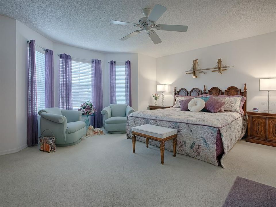 GUEST BEDROOM- OVERSIZED-LOVELY WINDOWS AND PLENTY OF NATURAL LIGHTING IN THIS GUEST BEDROOM