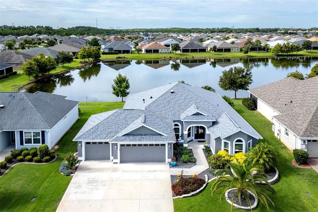 BOND PAID! WATER VIEW! Welcome to this stunning EXPANDED Gardenia home in the desirable village of Osceola Hills.