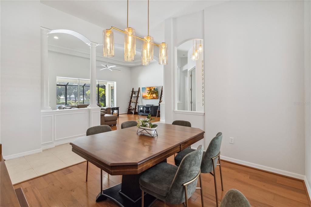 High end decorative light fixtures and ceiling fans. Plenty of space in the dining room to host family gatherings and holiday dinners.