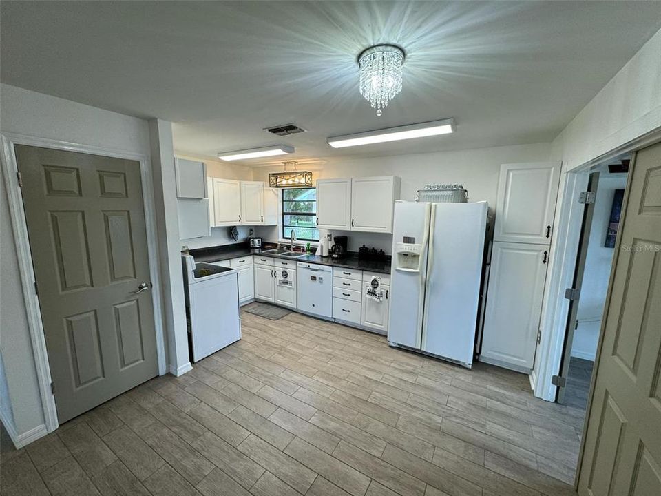 Kitchen, pantry closet, and dining area