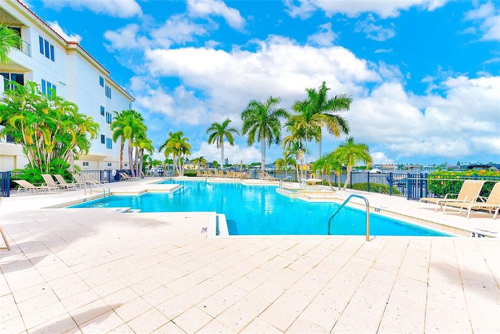 Pool with patio designed so you don't burn your feet