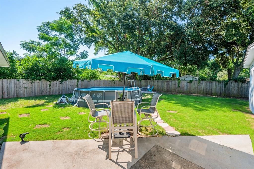 Spacious back patio, plenty of space for a table & grill!