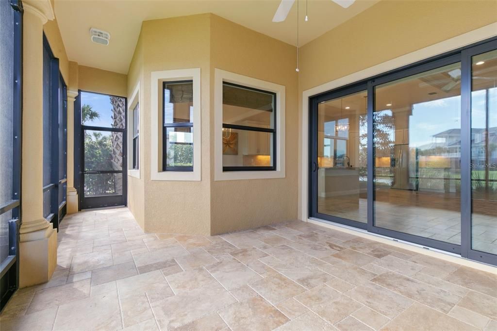 Large screened in lanai with travertine floors