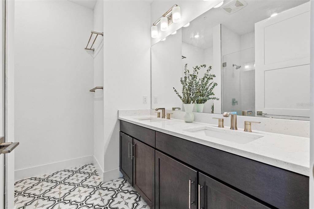 Master bath with dual sinks and walk in shower