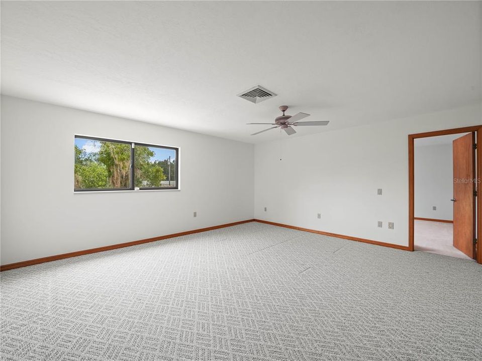 Primary Bedroom with door to adjoining room