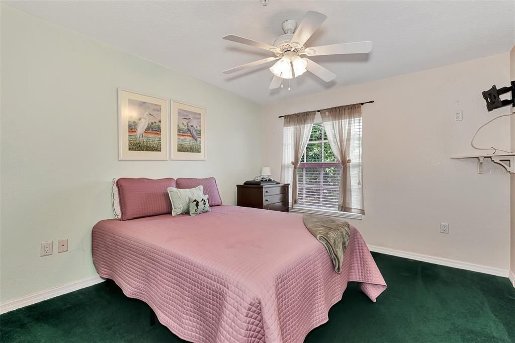 Bedroom 2 with wall of closets