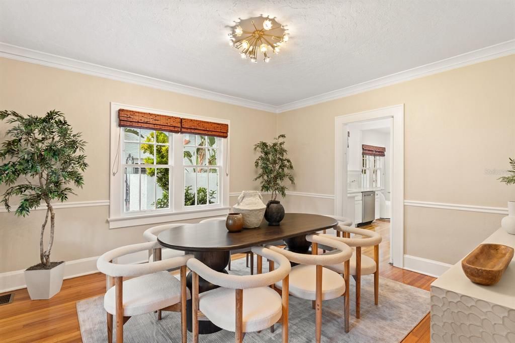 Gorgeous dining room connects to the kitchen with a swinging butler door.