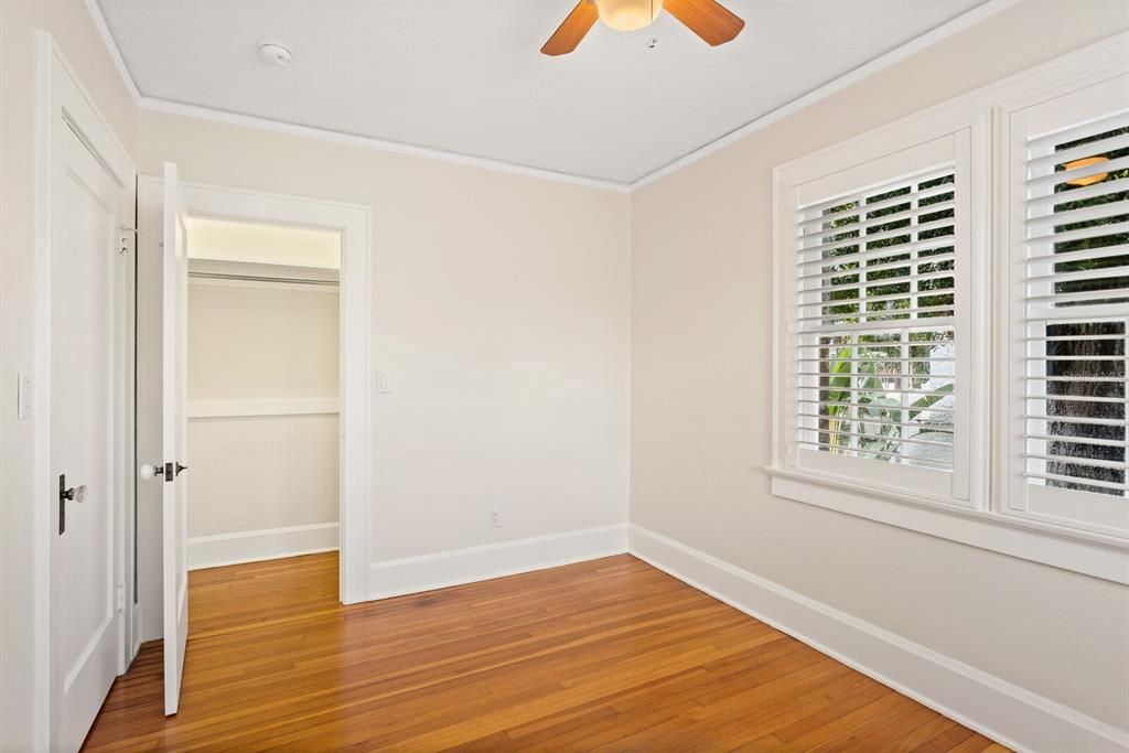 Upstairs rear bedroom.