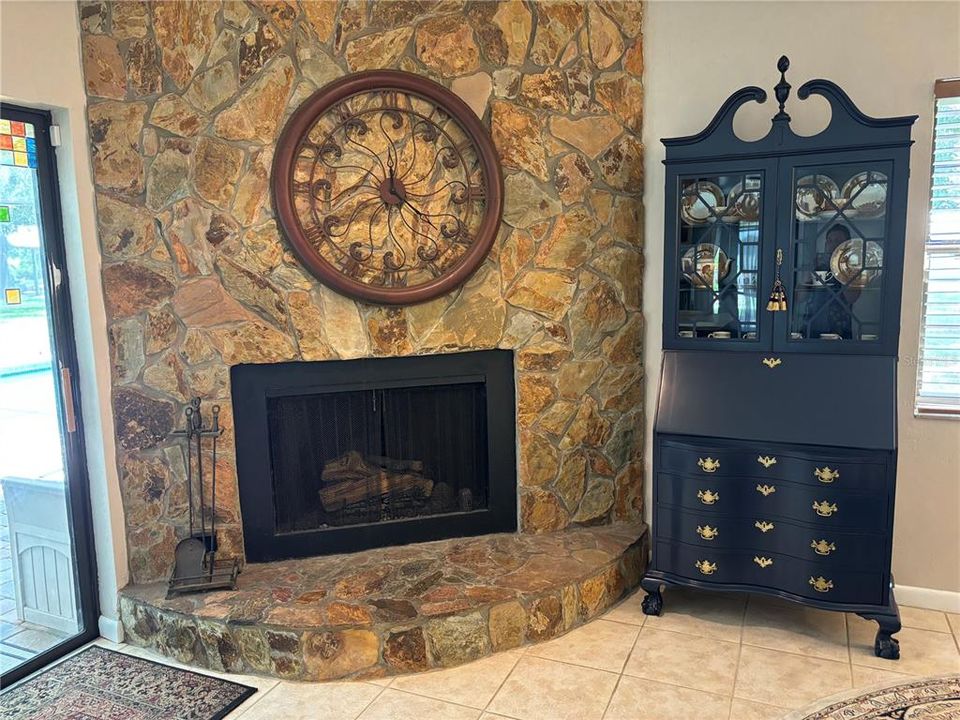 Fireplace off of the kitchen