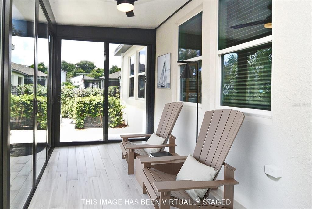 Sitting area in sunroom overlooking garden