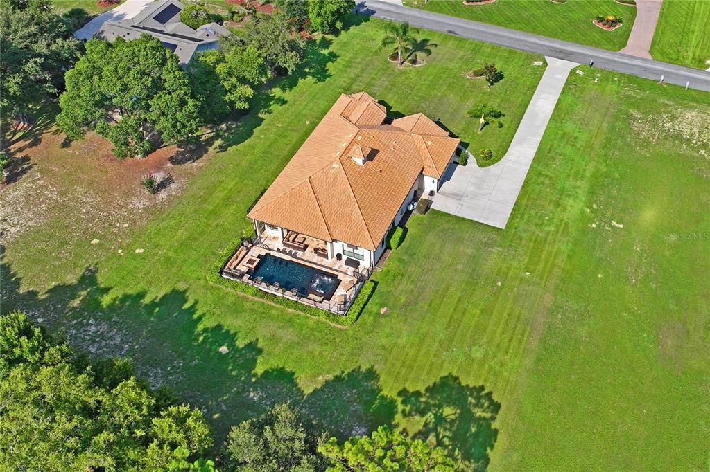 Drone footage over the Pool and backyard