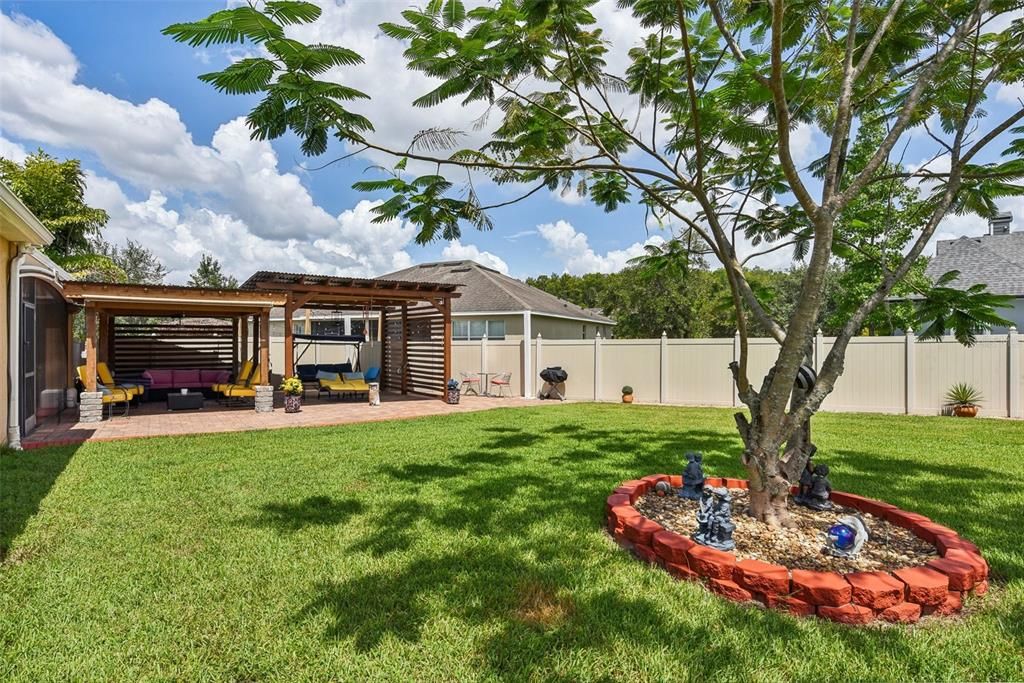 A Portion of the Backyard with 2 Pergola's