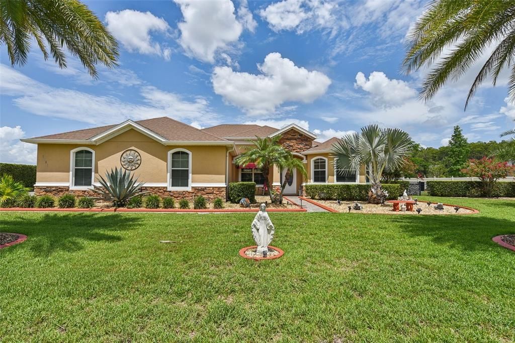 The first thing you will notice when you pull up to the home is the Home’s Luxury Architectural Features, Quality Construction and Professional Landscaping that looks like it should be THE COVER OF ANY HIGH-END REAL ESTATE PUBLICATION!