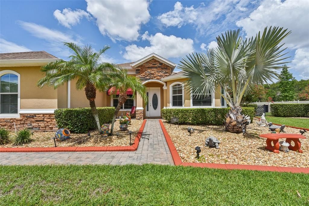 The first thing you will notice when you pull up to the home is the Home’s Luxury Architectural Features, Quality Construction and Professional Landscaping that looks like it should be THE COVER OF ANY HIGH-END REAL ESTATE PUBLICATION!