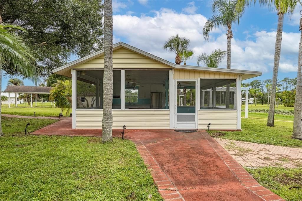 Enclosed tiki with kitchen