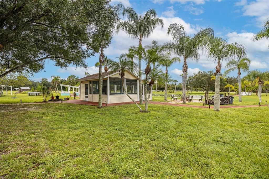 Enclosed tiki with kitchen