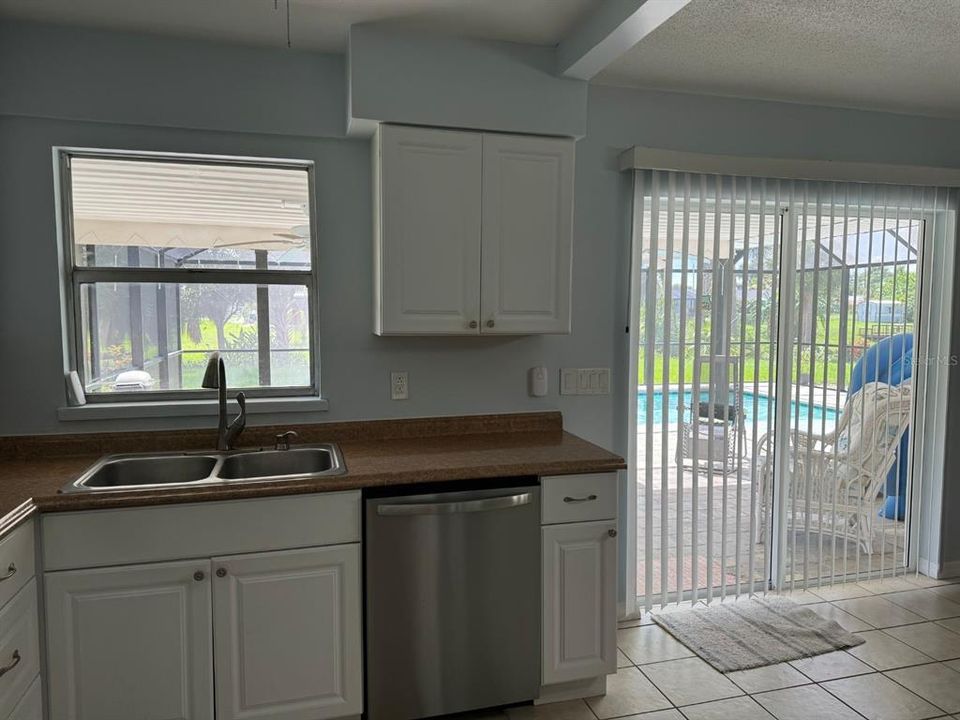 Kitchen with view of pool