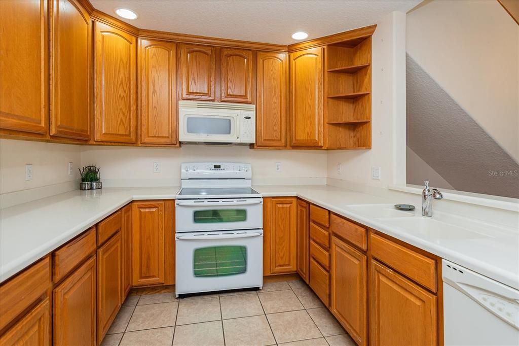 Kitchen with pass through window to the dining room