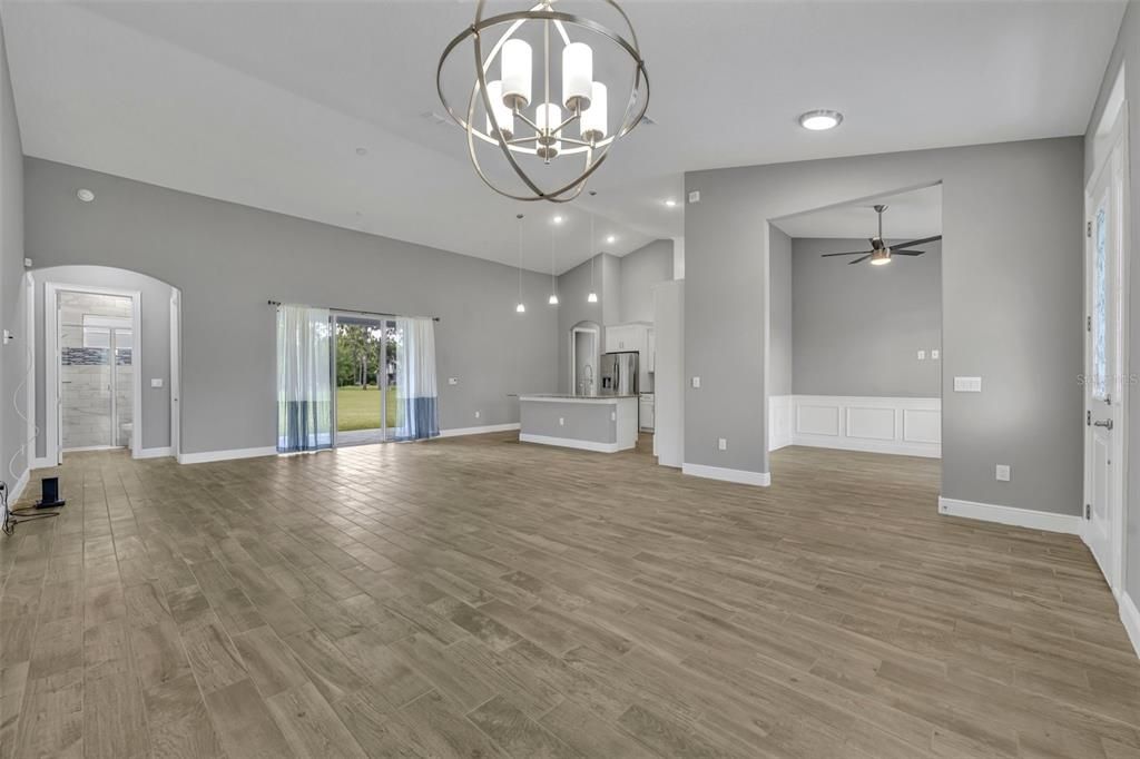 View from the dining room area towards the kitchen and great room