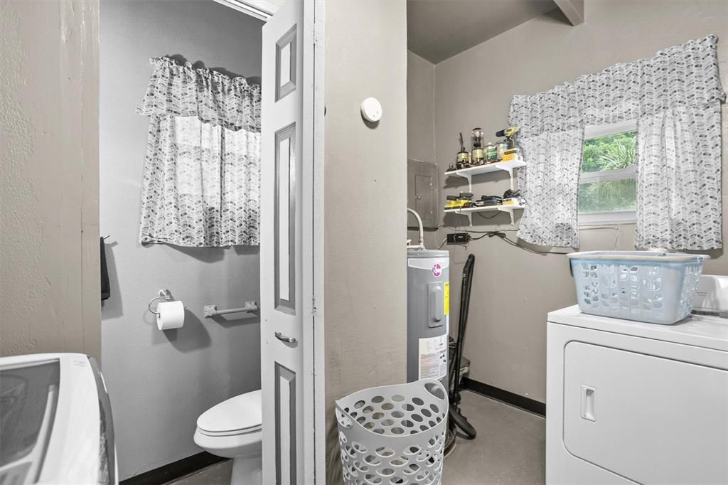 Laundry Room with half bath