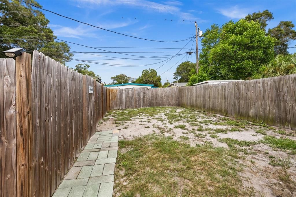 Fenced Play space, gate on left to pool