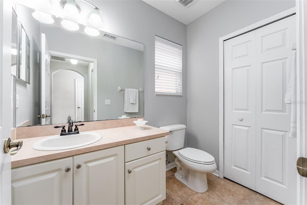 Downstairs 1/2 Bathroom  with large storage closet