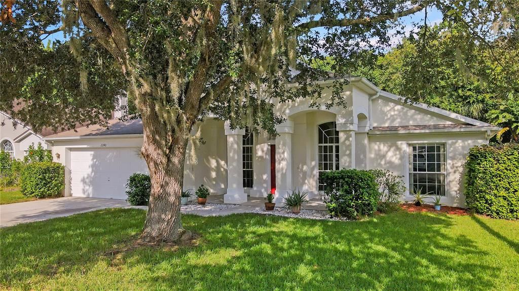 Gorgeous FOUR-Bedroom, Two-Bath Estate Home Backing to Wooded CONSERVATION AREA with No Rear Neighbors in Sought-After Riverside at Twin Rivers in the Heart of Oviedo! HOLY COW!