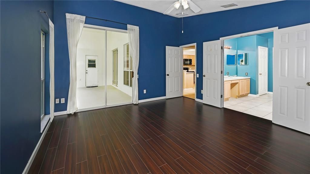 Master Bedroom, View #1 > Bright Ceramic Tile and Brazilian-HARDWOOD Flooring Throughout entire Home !