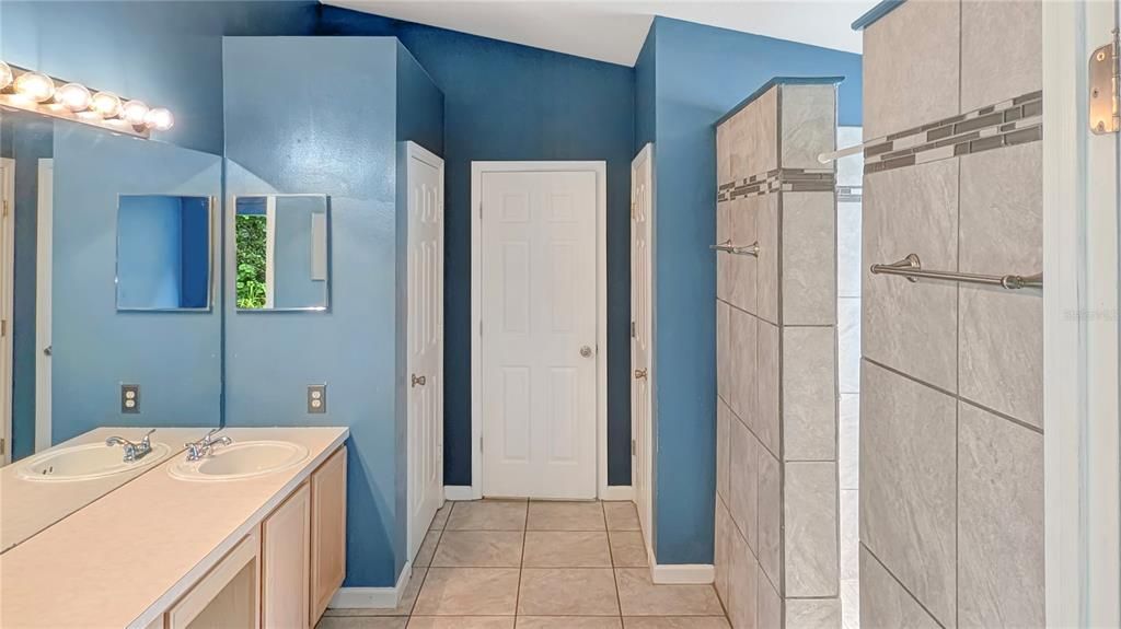 Remodeled MASTER BATH with Extra-Large His-&-Hers Shower with TWO Showerheads!  Huge 12x6 Walk-In Master Closet will give You Room to spare!