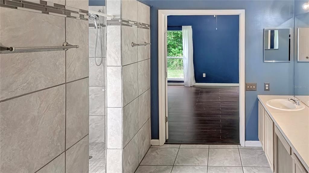 Remodeled MASTER BATH with Extra-Large His-&-Hers Shower with TWO Showerheads!  Huge 12x6 Walk-In Master Closet will give You Room to spare!