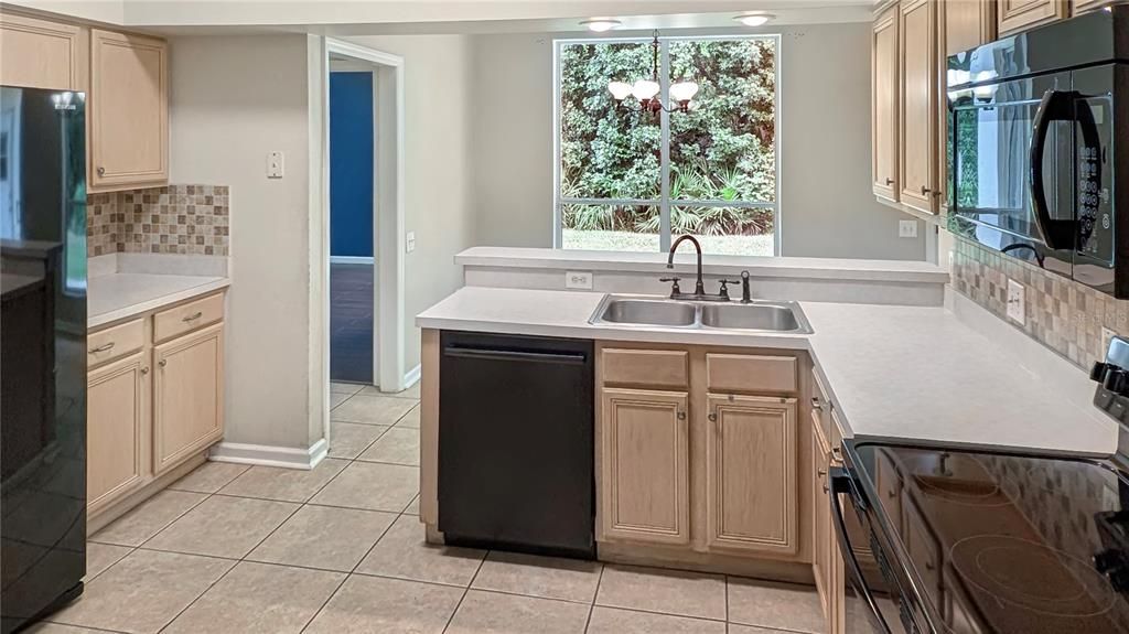 Kitchen with a Fantastic View of the Conservation Belt in Your Backyard!