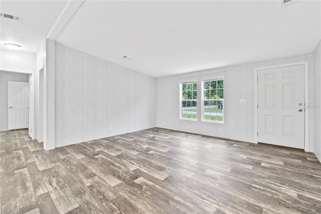 Living Room w/ view of Entry Way