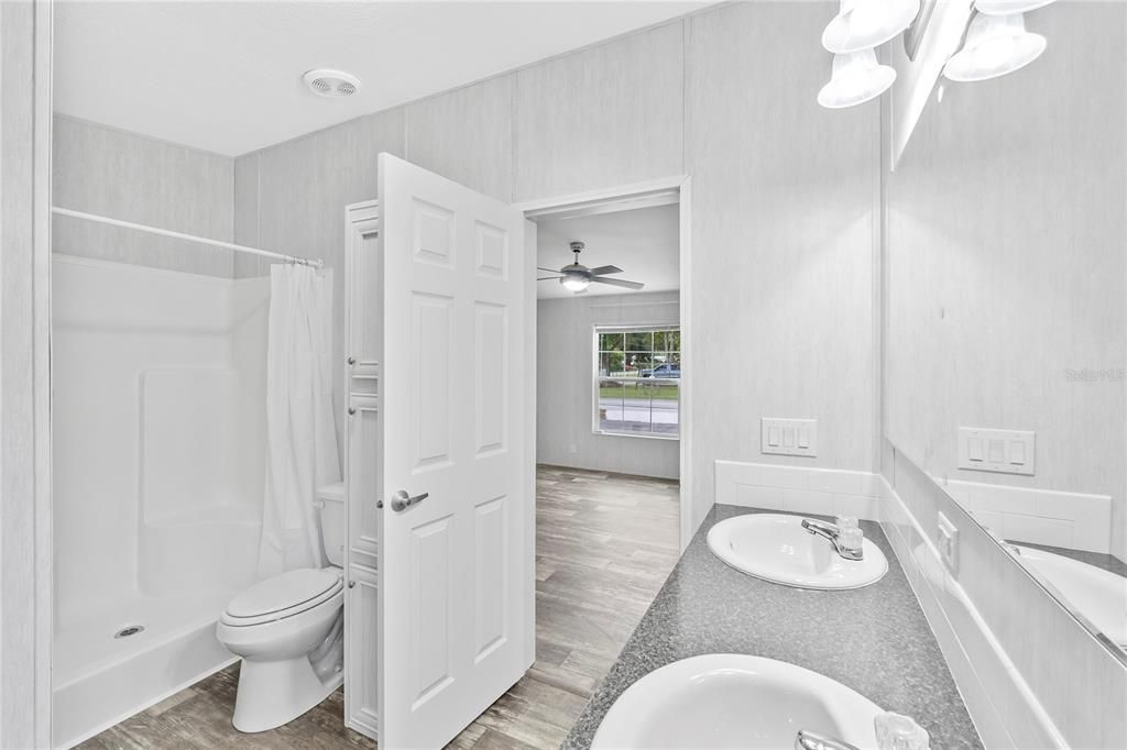 Primary Bathroom w/ Separate Shower and Linen Pantry